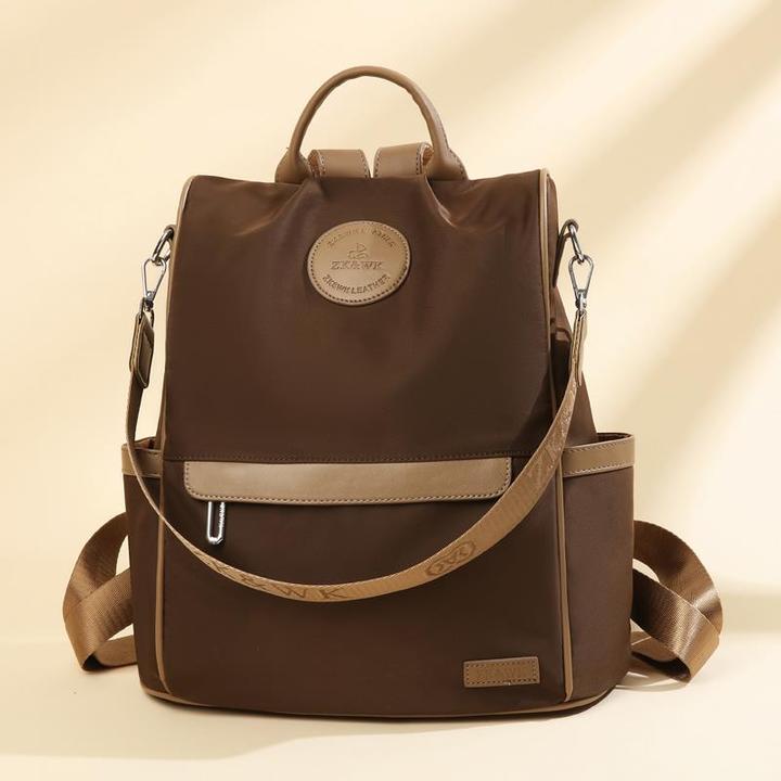 米琦袋鼠简约双肩包学生书包2025新款时尚百搭轻便大容量旅行背包