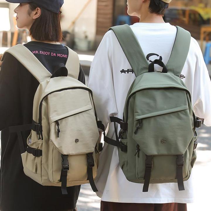 大容量双肩包男士外出轻便旅行电脑背包初中高中大学生上课书包女