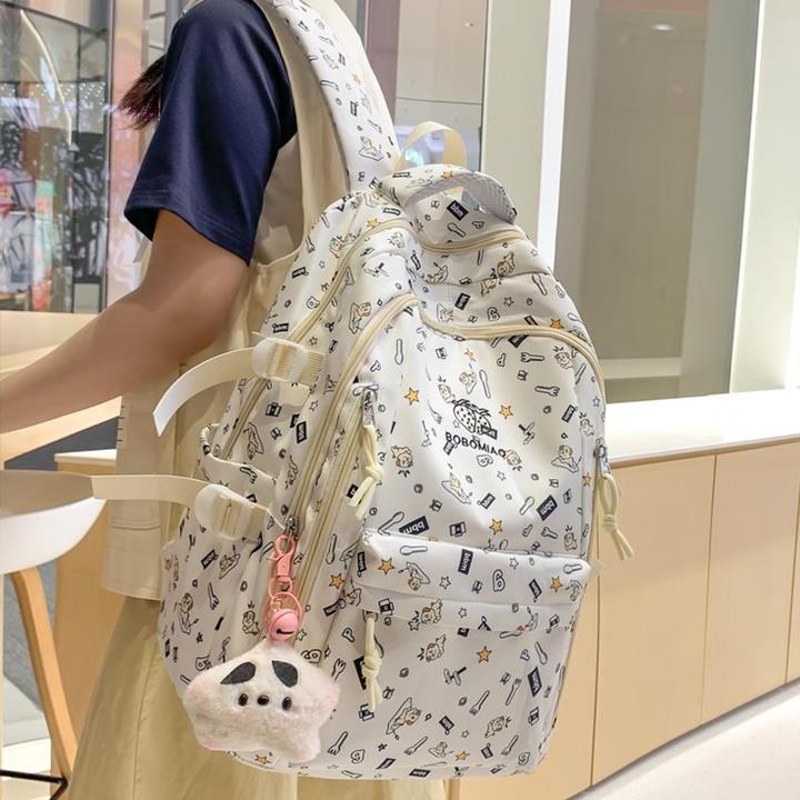 书包初中女生2024夏新款高中大学生印花背包百搭大容量电脑双肩包