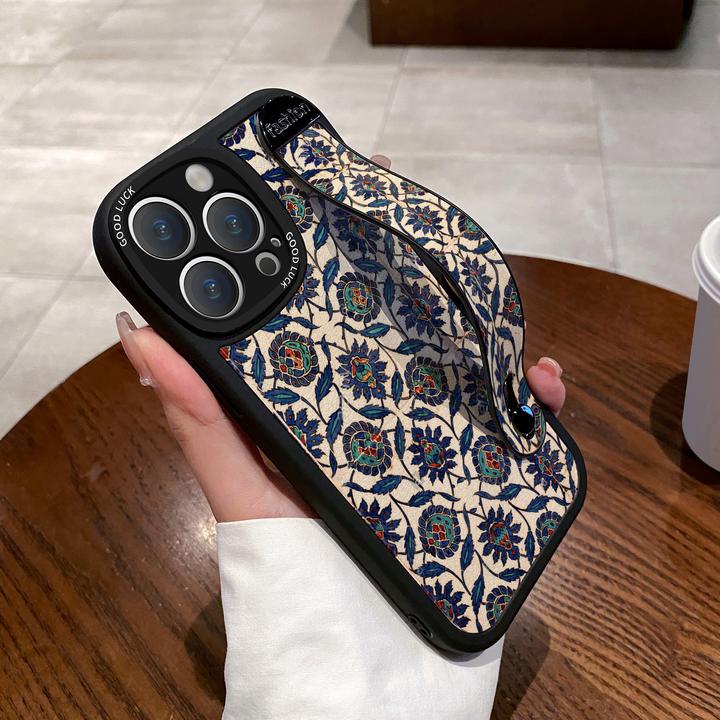 适用苹果17promax手机壳拼接花纹iPhone16pro保护套17pro腕带支架