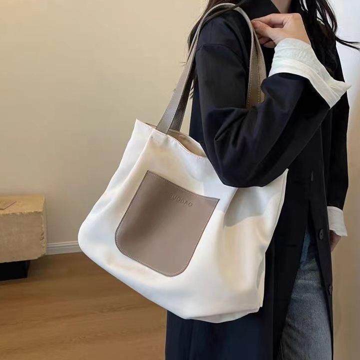 休闲大容量包包女2024新款简约百搭通勤单肩帆布托特包轻便旅行包