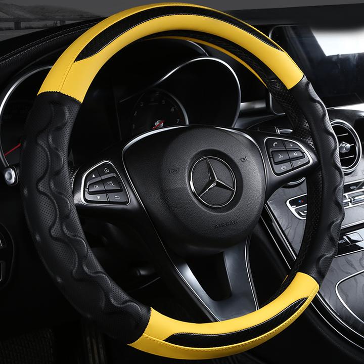 厂家制作新款把套时尚拼接四季可用耐磨汽车方向盘套皮革碳纤维耐