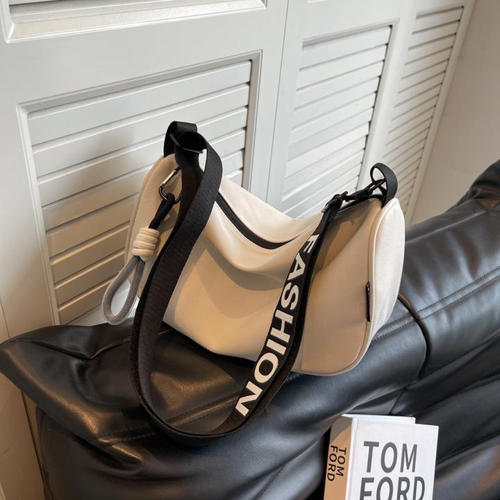 高级感牛津布时尚饺子包斜挎女2025新款百搭休闲运动风单肩枕头包