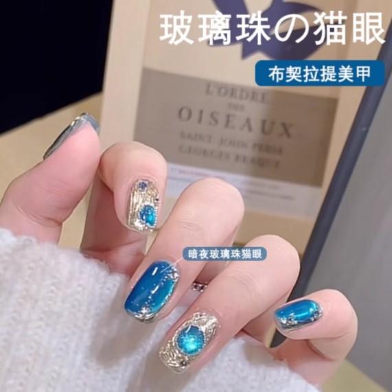 布契拉提蓝宝石猫眼指甲油胶2025年新款秋冬电镀陶瓷玻璃珠猫眼胶