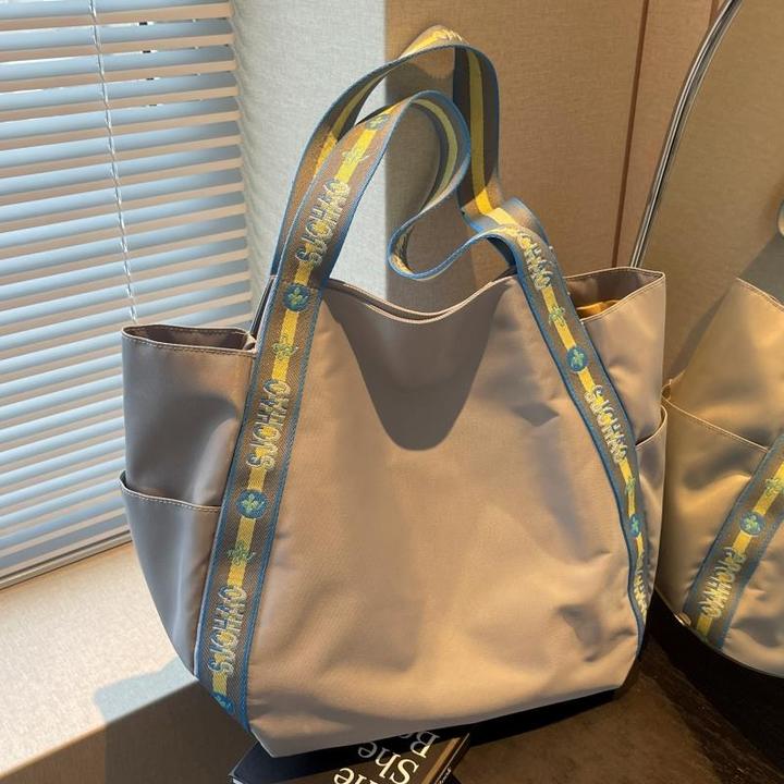 大容量包包女2024新款小众设计百搭单肩大包休闲手提通勤托特包潮