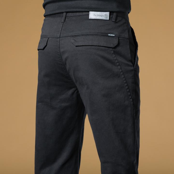 香港2025高端黑色休闲裤男士秋冬款修身直筒百搭商务男装长裤子男
