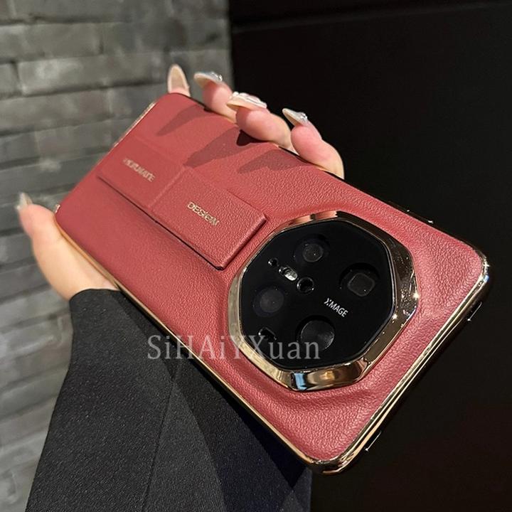 适用华为mate70rs非凡大师手机壳新款70pro+腕带支架素皮纹70创意