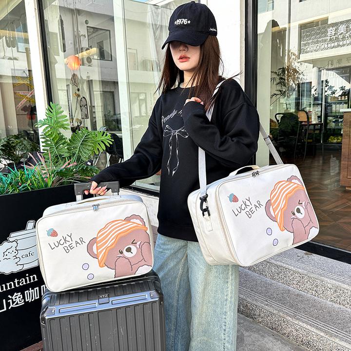 卡通收纳包大容量便携防水手提旅行衣物收纳袋行李袋拉杆包收纳袋