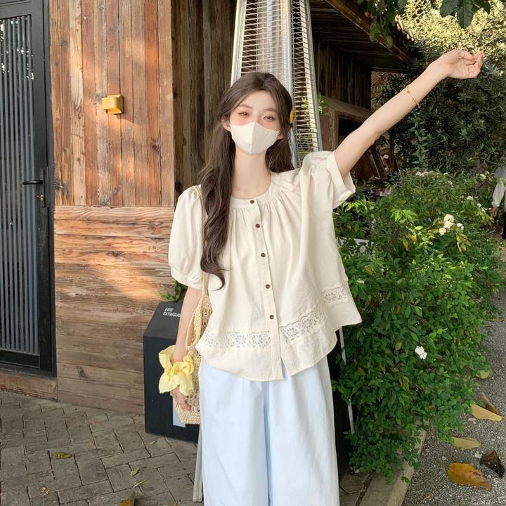 宽松蕾丝拼接简约衬衫女夏季新款圆领单排扣泡泡袖百搭气质衬衣潮