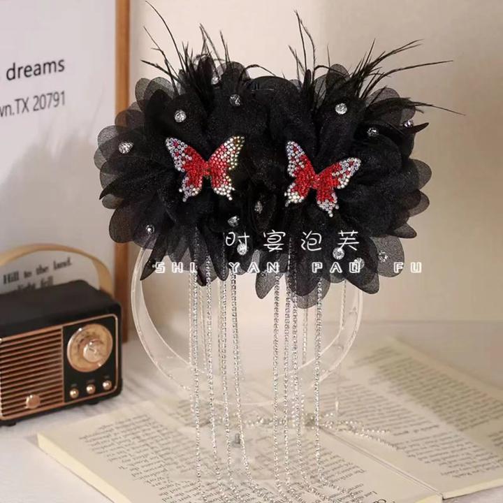 九重紫冬季新款优雅流苏羽毛抓夹显发量蓬松高颅顶鲨鱼夹发夹女