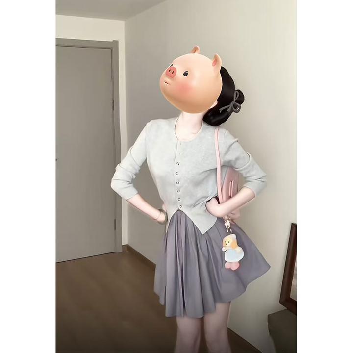 2025年春夏新款chic网红同款少女感减龄下摆开叉针织衫配高腰半裙