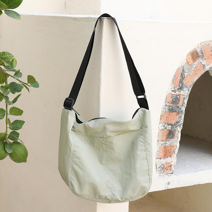 日韩版休闲百搭尼龙帆布托特包女大容量轻便简约运动风单肩斜挎包