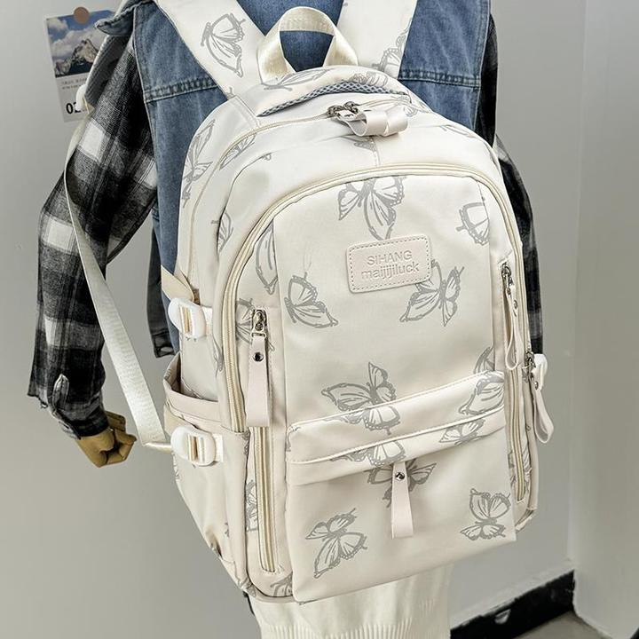 学生书包少女小学简约新款大容量双肩包大学生背包外高中生大容量
