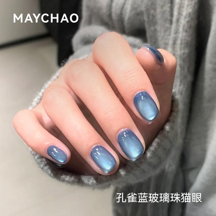 美潮爆款孔雀蓝猫眼甲油胶2025年显白爆闪冰透玻璃珠猫眼指甲油胶