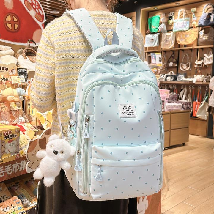 高颜值波点印花中学生书包女大容量轻便双肩包可爱少女高中生背包