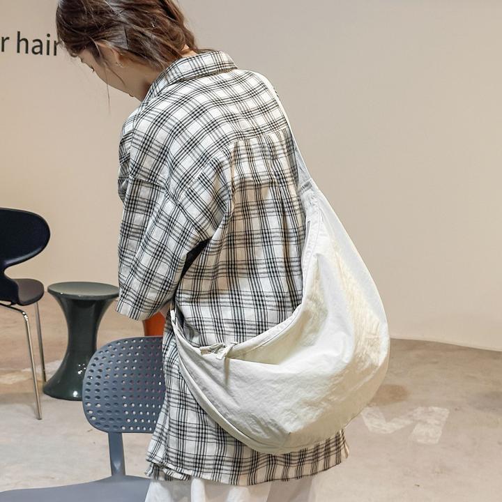 日单！家同款男女高级休闲挎包饺子包大容量轻便25春新款474155