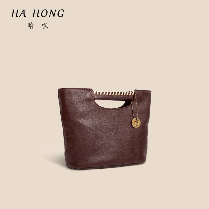 哈弘头层牛皮小众设计女款斜挎包2025复古简约小方包时尚包包