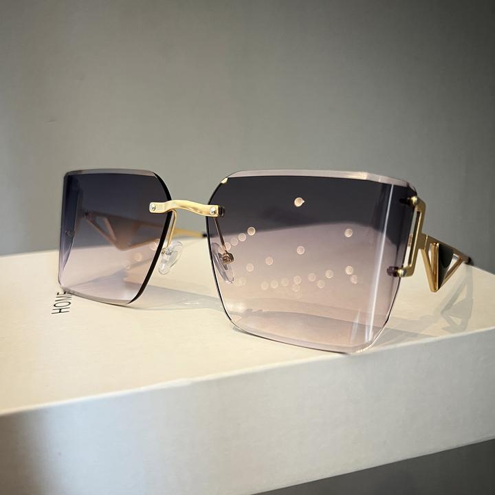 laoping 2025新款紫色多边形无框切边太阳镜防紫外线墨镜女高级感