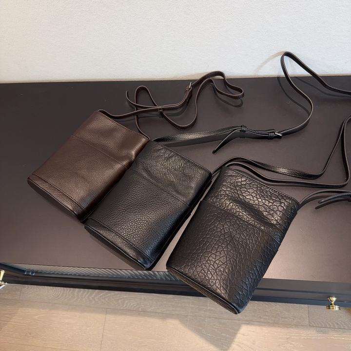 手机包女士斜挎包多功能水桶包竖款黑色单肩零钱包休闲风