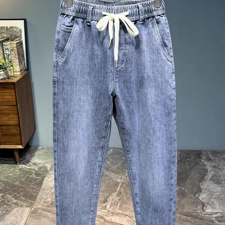 春夏男士新款时尚抽绳宽松直筒哈伦牛仔裤子1088