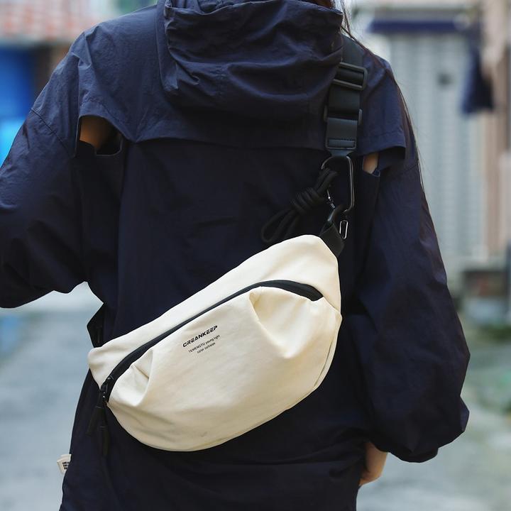 休闲户外骑行斜挎包轻便时尚尼龙布男女通用宽肩带单肩包腰包胸包