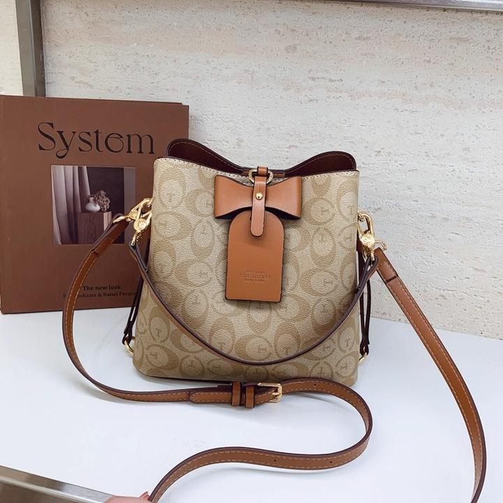 时尚复古洋气包包女2026新款水桶包高级感小众百搭手提单肩斜挎包