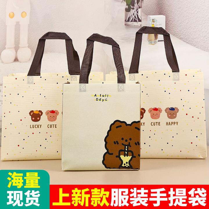 卡通小熊无纺布袋NICE熊童装服装店打包带购物礼品手提袋现货批发