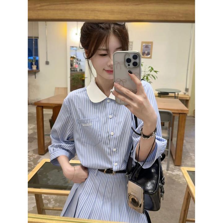 学院风蓝白条纹套装女春季2025新款娃娃领衬衫蕾丝拼接半裙两件套
