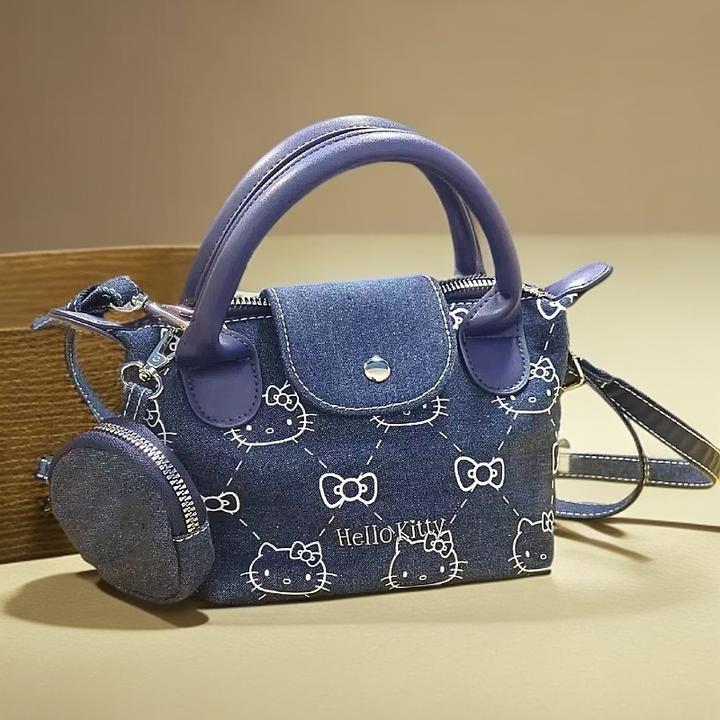 可爱夏天小众夏季KT猫手提包女2025新款三折真皮斜挎包迷你饺子包