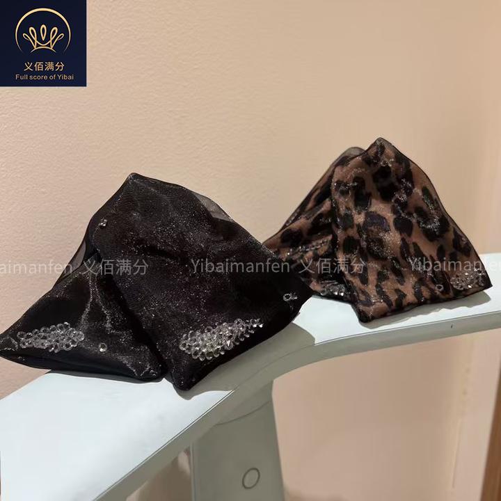 义佰满分高级感优雅流沙水钻抓夹2025年新款豹纹鲨鱼盘发夹头饰