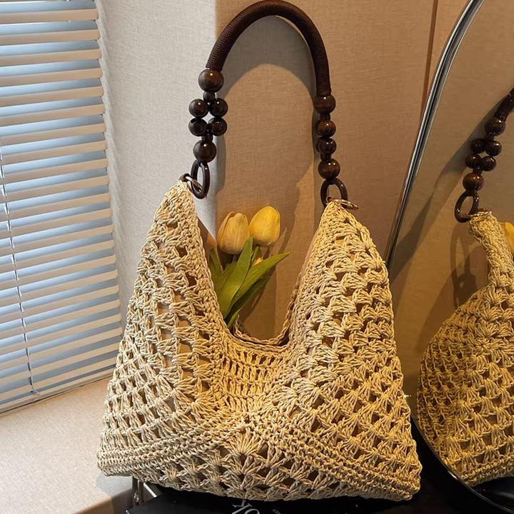 夏天草编包包女2025新款海边度假沙滩镂空单肩托特包编织菜篮子包