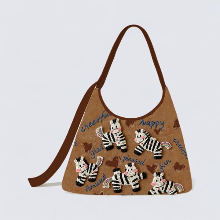 尼睿设计师原创刺绣马上开心新月加侧斜挎包百搭单肩大容量通勤女