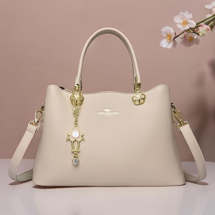 正品专柜2025新款气质简约大容量女士斜挎包高级感软皮女包手提包