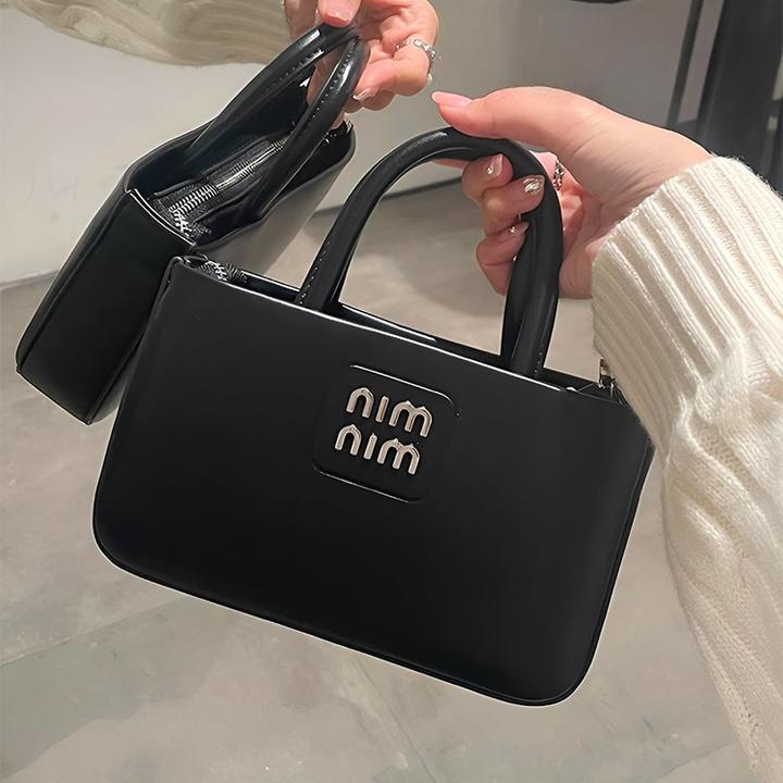 香港正品小众黑色手提拎包包女式2026超火新款单肩腋下斜挎包秋冬