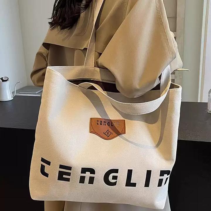 大容量帆布包包女秋冬百搭2024新款休闲单肩大学生上课通勤托特包