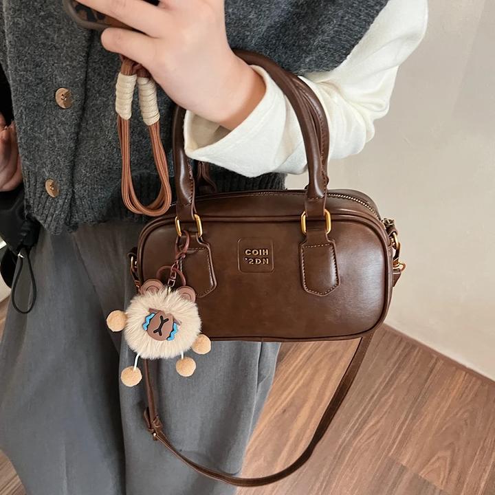 高级感小众包包女2024新款秋冬季百搭复古斜挎包超火手提保龄球包