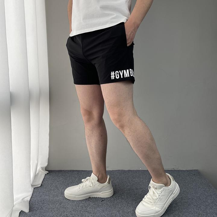 四面弹速干运动短裤男三分裤 双层透气健身跑步3分裤夏季性感舒服