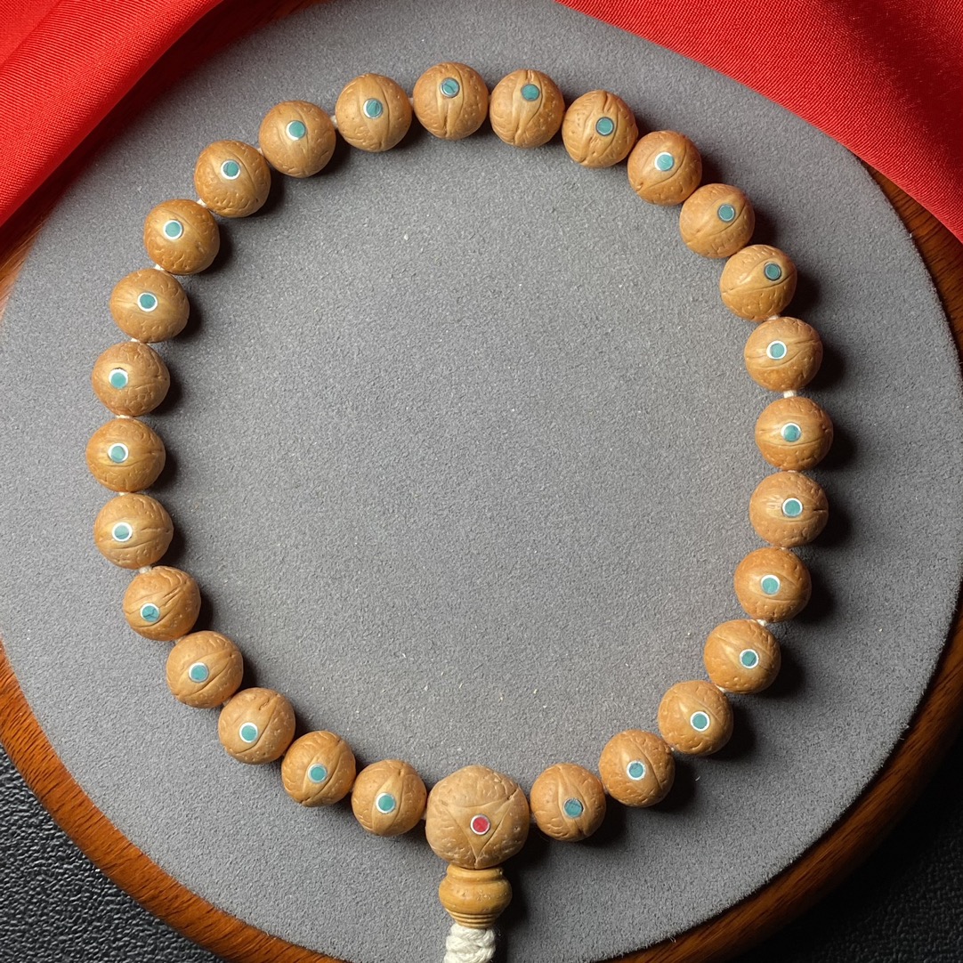 尼泊尔11.5mm小凤眼菩提手持镶嵌绿松黄皮