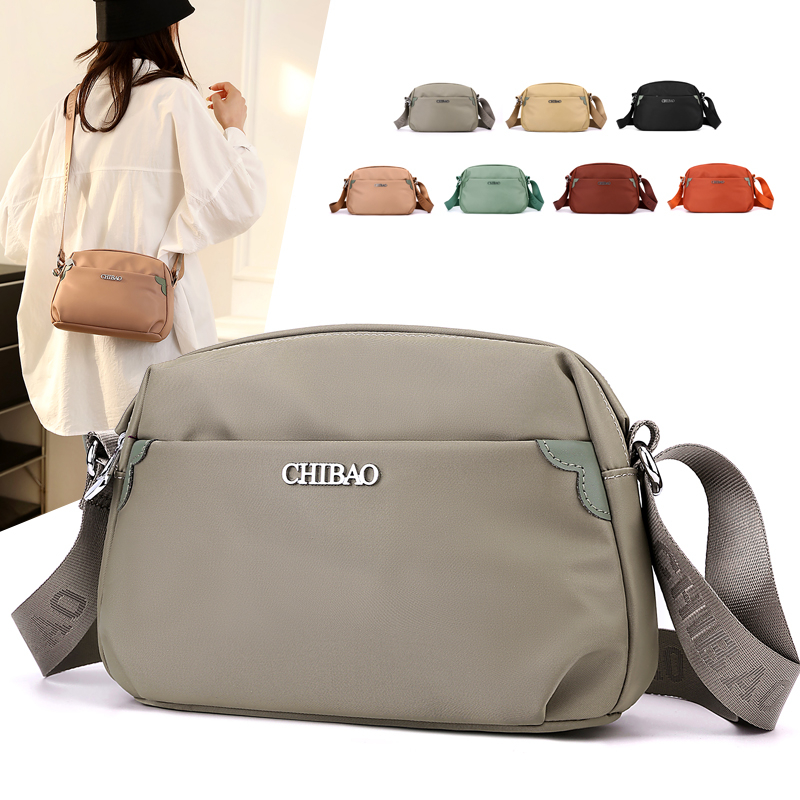 韩版时尚百搭牛津布包斜挎包简约轻便中老年妈妈女士包帆布包女包