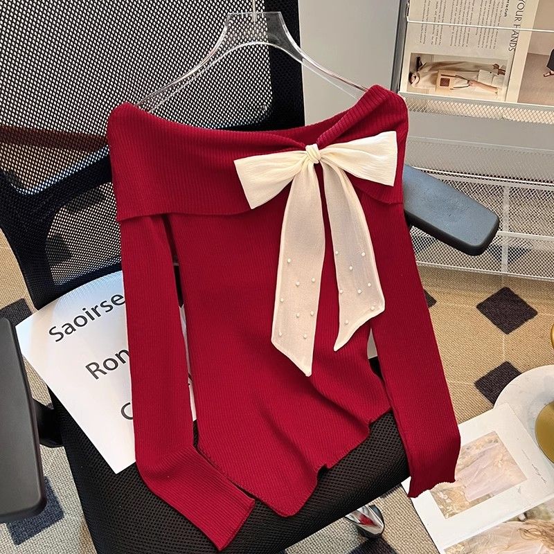 钉珠蝴蝶结绑带不规则一字肩长袖T恤女秋季打底衫辣妹别致上衣潮