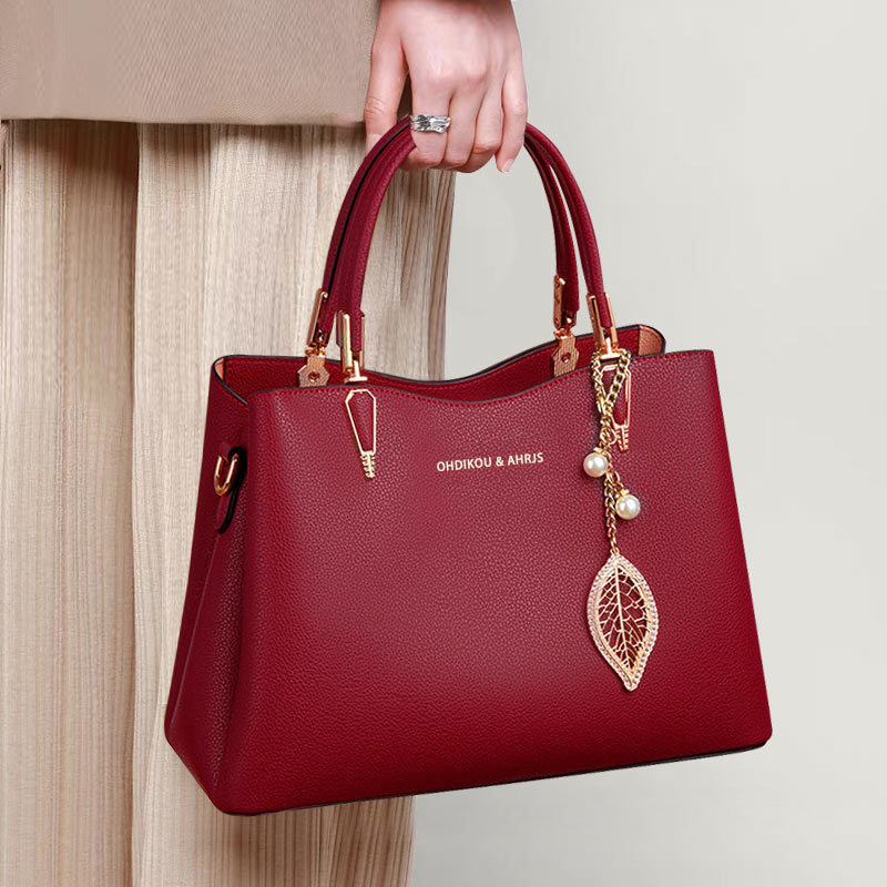 香港轻奢包包2025新款中年斜挎包女包红色结婚手提包妈妈包大容量