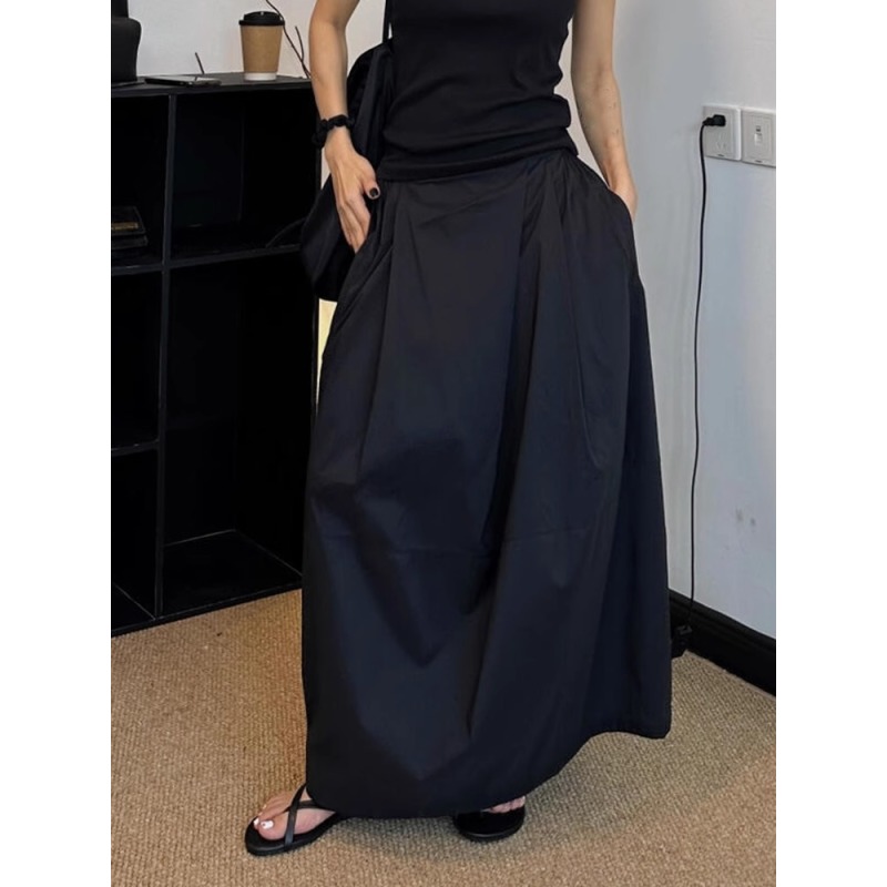 小众设计感不规则黑色半身裙2025春季新款洋气百搭宽松a字花苞裙