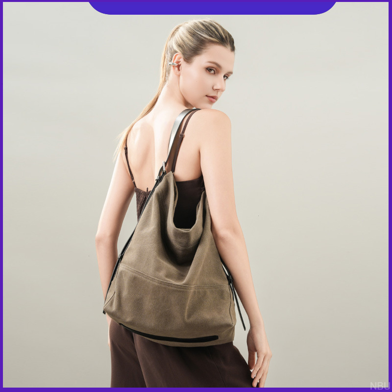 牛皮腋下通勤高级感托特包时尚文艺小众单肩手提大容量帆布包