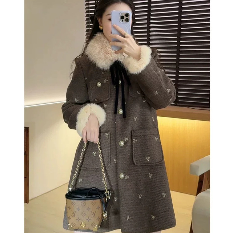 羽绒连衣裙设计感冬季名媛氛围感羊毛呢外套鸭绒潮气质厚款单排扣