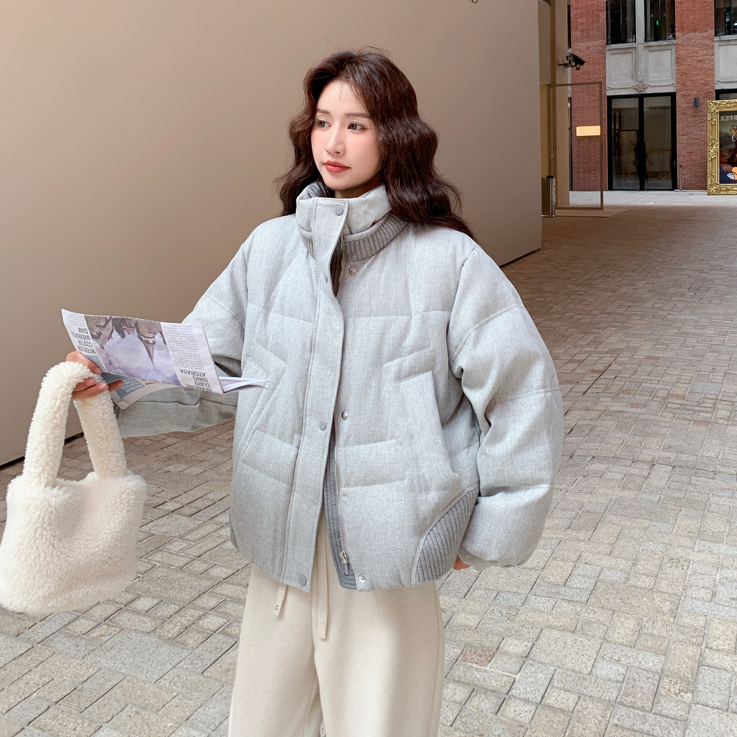 针织拼接立领短款羽绒服女冬季2025新款设计感休闲90白鸭绒面包服