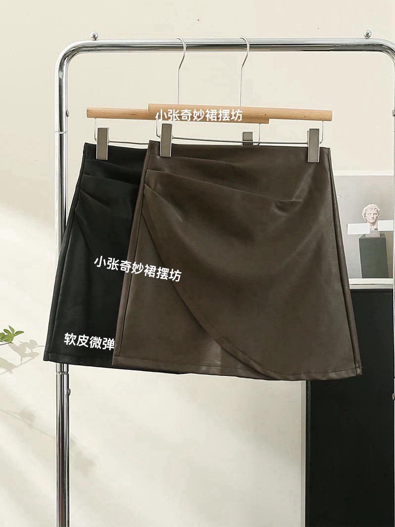 秋冬新款高腰褶皱黑色毛呢A字短款女士小皮裙防走光显瘦不规则