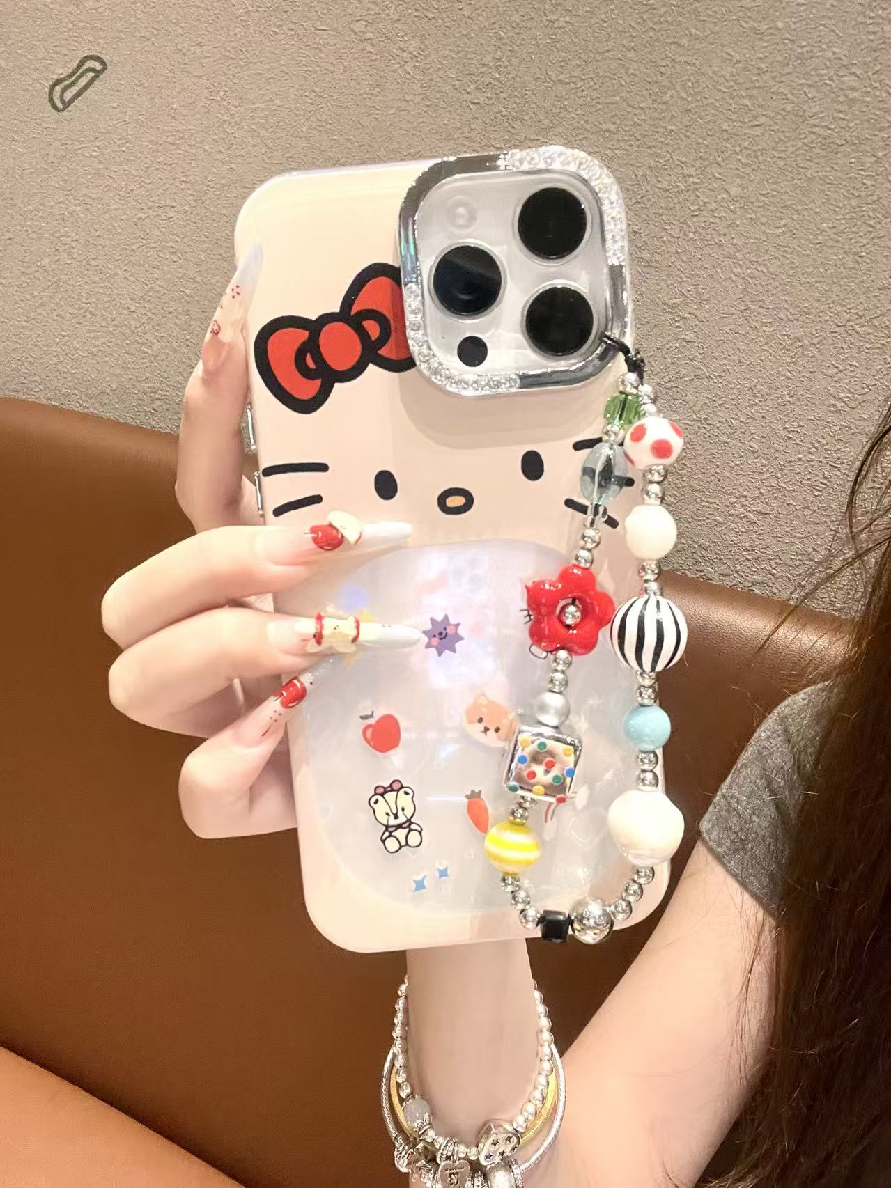 INS风可爱KT表情贝壳纹花朵适用苹果16/15/14/13防摔手机壳