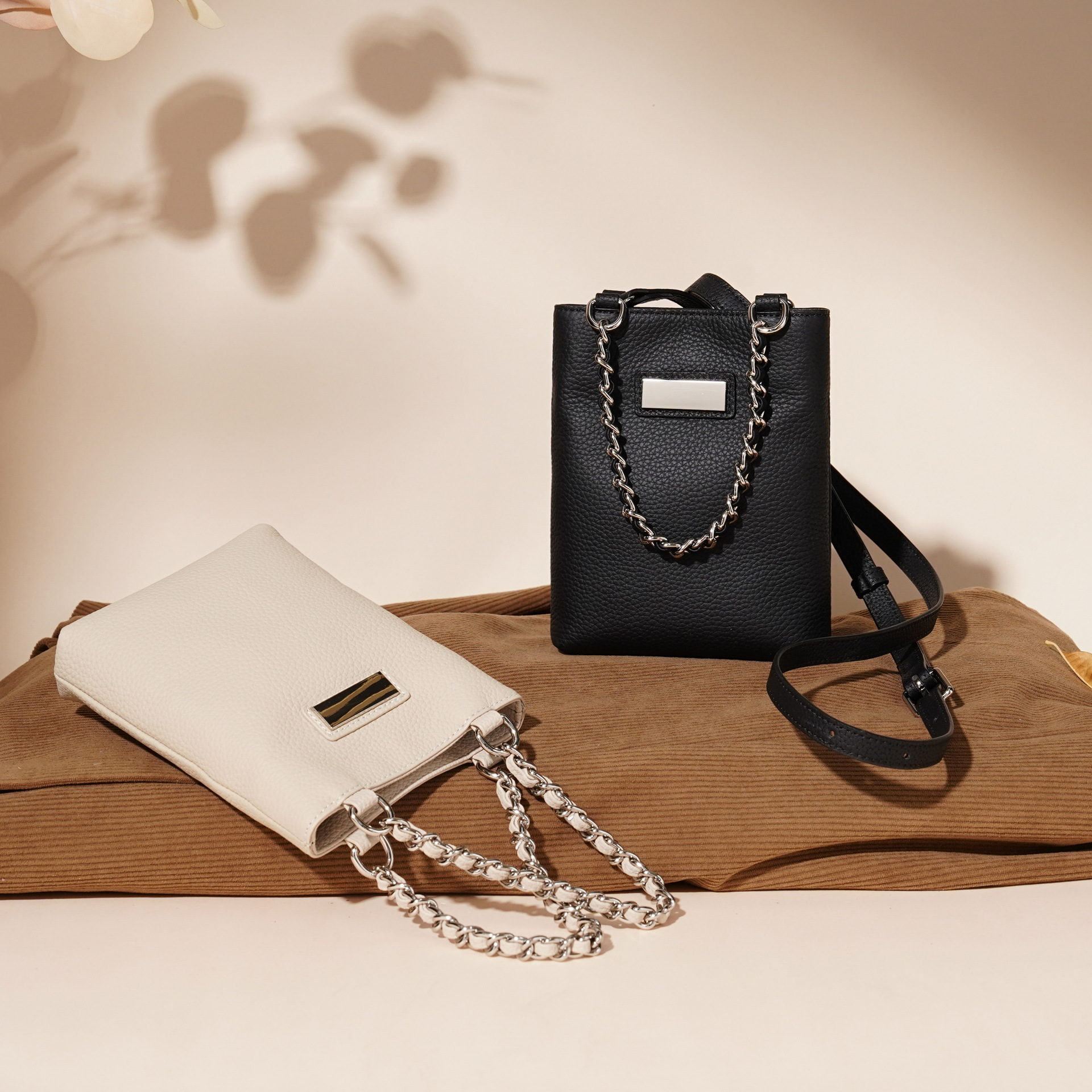 头层牛皮单肩斜挎小包手机包女百搭2025新款真皮竖款休闲小水桶包