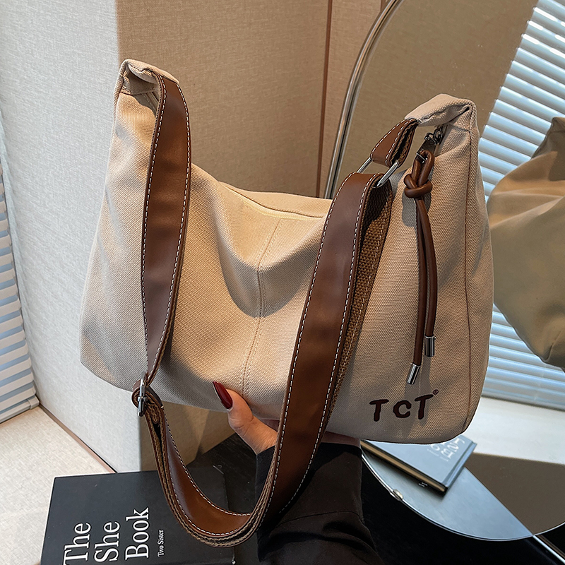 大容量包包女夏季2025新款帆布单肩斜挎通勤包休闲百搭上课托特包