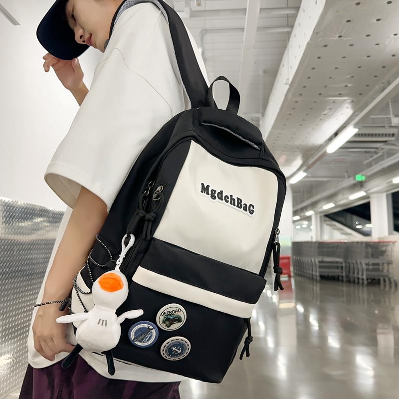 FAVMARTHA中学生男书包女初中生大容量高中生小学生双肩包男大学